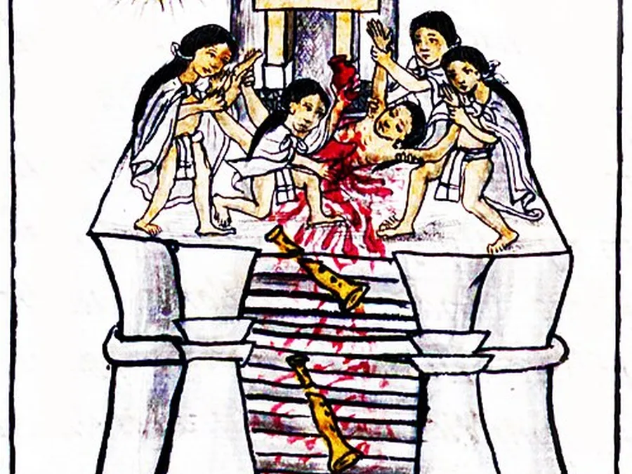 Manuscript painting of Aztec priests performing a heart sacrifice at the top of a temple stair.
