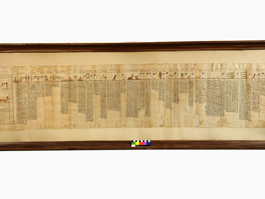 Color photograph of a Book of the Dead papyrus panel of Taysnakht with funerary scenes and Egyptian text.