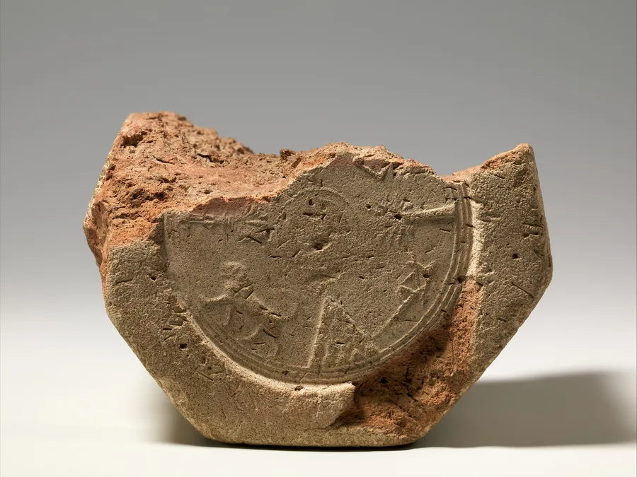 Clay cuneiform prism of Esarhaddon describing the restoration of Babylon.