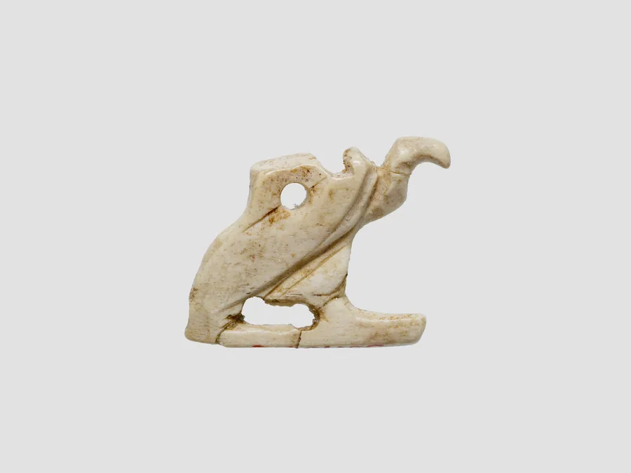 Small Egyptian ivory or bone vulture amulet.