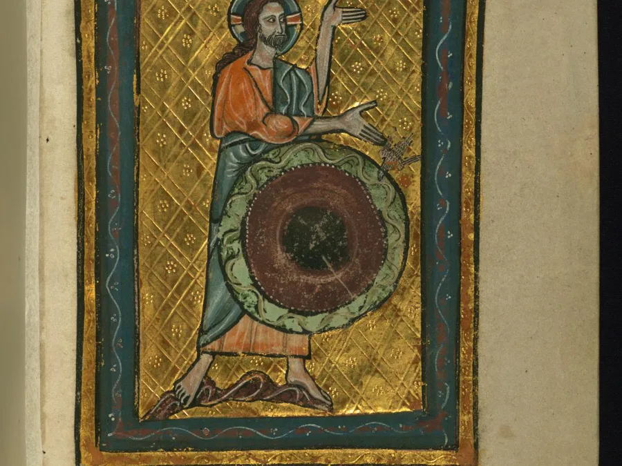 Medieval illumination showing the first two days of creation from Genesis.
